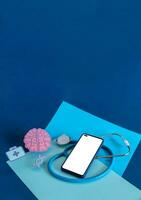The medicine panel and smart phone on blue background. photo