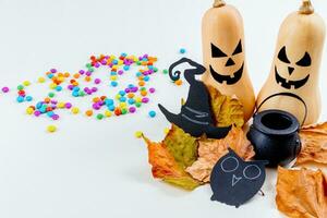Halloween frame of scattered candy and decor. Halloween concept. photo