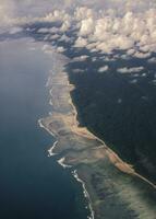 a view of the ocean and land from above photo