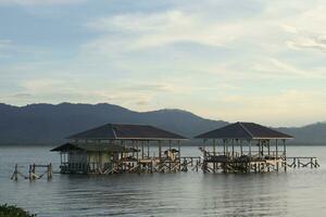 Abandoned wooden pier on Limboto lake photo