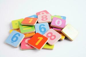 Number wood block cubes for learning Mathematic, education math concept. photo