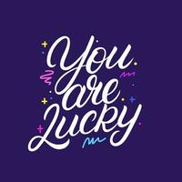 You are Lucky hand written lettering. Modern calligraphy quote, phrase. Vector Illustration.