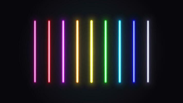 A set of neon glowing lamps. Bright multicolored lasers on a dark background.