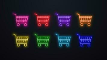 A set of neon bright glowing trolley icons for products in different colors green, red, blue, purple, orange, yellow on a black background. vector
