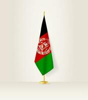 Afganistán bandera en un bandera pararse. vector