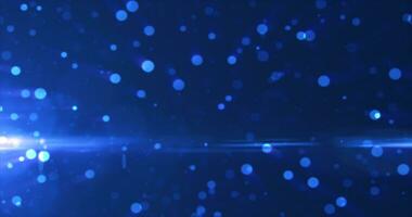 Abstract background of blue glowing particles and bokeh dots of festive energy magic photo