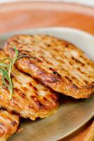 tteokgalbi, korean Grilled Short Rib Patties, Minced beef rib meat seasoned with garlic and soy sauce, molded around the bone and chargrilled while brushing with a soy sauce mixture. photo