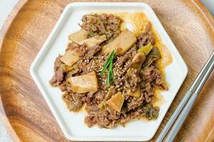 Bulgogi, korean food, Bulgogi is prepared with beef that has been marinated in soy sauce, honey, minced green onion, garlic, sesame seeds, and pepper, and then grilled. photo