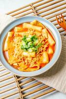 Rabokki, Korean style Stir-fried Instant Noodle, This dish is tteokbokki with ramen noodles. Tteokbokki is a spicy dish made with rice cake, vegetables, and fish cake photo