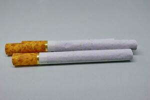 Indonesian kretek cigarettes with white isolation photo