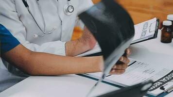 Medical or scientific researcher or man doctor looking at a test tube of clear solution in a laboratory video