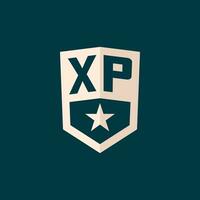 Initial XP logo star shield symbol with simple design vector