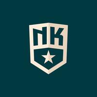 Initial NK logo star shield symbol with simple design vector