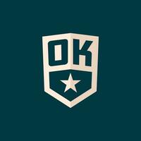 Initial OK logo star shield symbol with simple design vector