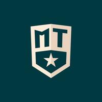 Initial MT logo star shield symbol with simple design vector