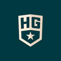 Initial HG logo star shield symbol with simple design vector