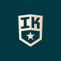 Initial IK logo star shield symbol with simple design vector