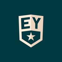 Initial EY logo star shield symbol with simple design vector