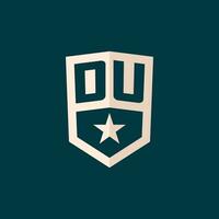 Initial DU logo star shield symbol with simple design vector