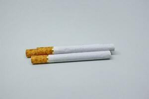 Indonesian kretek cigarettes with white isolation photo