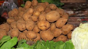 Fresh organic potatoes in the market photo