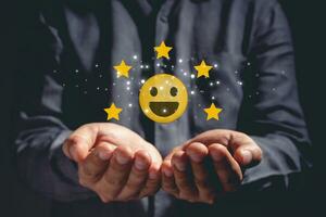 Infographics and icons Customer Satisfaction Assessment. concept social network emotion smile form in hand. photo