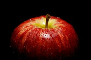 Fresh red apples on black background photo