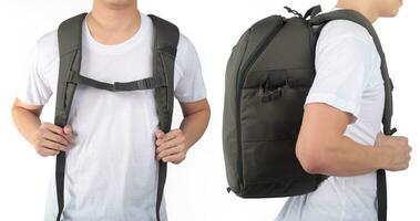 Young man standing with travel backpack equipments isolated white background photo