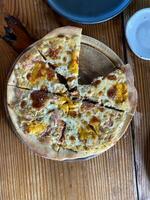 homemade pizza not full on wood table, italian fast food kitchen photo