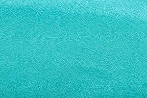 Blue ocean paper foil on background texture. photo