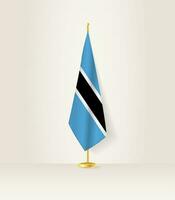 Botswana bandera en un bandera pararse. vector