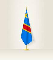 Dr congo bandera en un bandera pararse. vector