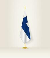 Finland flag on a flag stand. vector