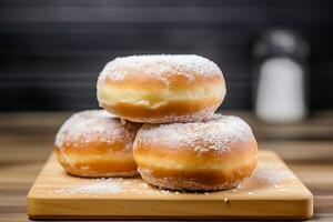 Sweet donuts with powdered sugar on wooden table in the kitchen. AI Generated photo