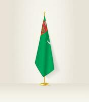 Turkmenistan flag on a flag stand. vector