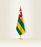 Togo flag on a flag stand. vector