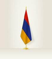 Armenia bandera en un bandera pararse. vector