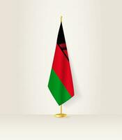 malawi bandera en un bandera pararse. vector