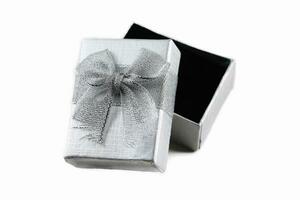 Silver gift box isolated on white background. photo