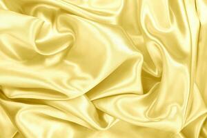 Gold fablic satin on background texture. photo