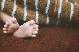Vintage style of new born little baby feet. photo