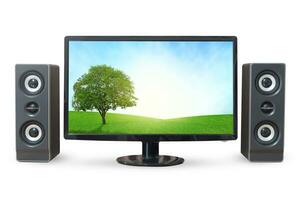 Monitor PC landscape and sound woofer isolated on white background. photo