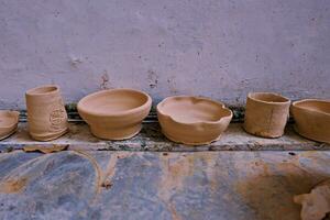 the activity of making handicrafts from clay or often called pottery class and some of the results photo