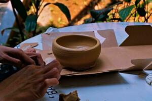 the activity of making handicrafts from clay or often called pottery class and some of the results photo