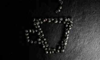 coffee beans in the shape of a cup photo