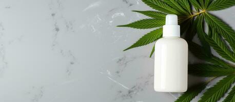 Eco friendly CBD lotion mockup with organic skincare product on marble table alongside green cannabis leaves photo