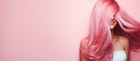 Portrait of happy woman with pink hair holding strawberry ice cream cone on pink background food concept photo