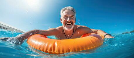 Cheerful man in pool with lifebuoy Summer recreation by water swimming pool construction in hotels and houses photo