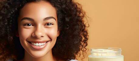 Smiling mixed race girl applying eco friendly cream photo