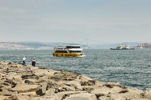 Transport ship sails Bosphorus photo